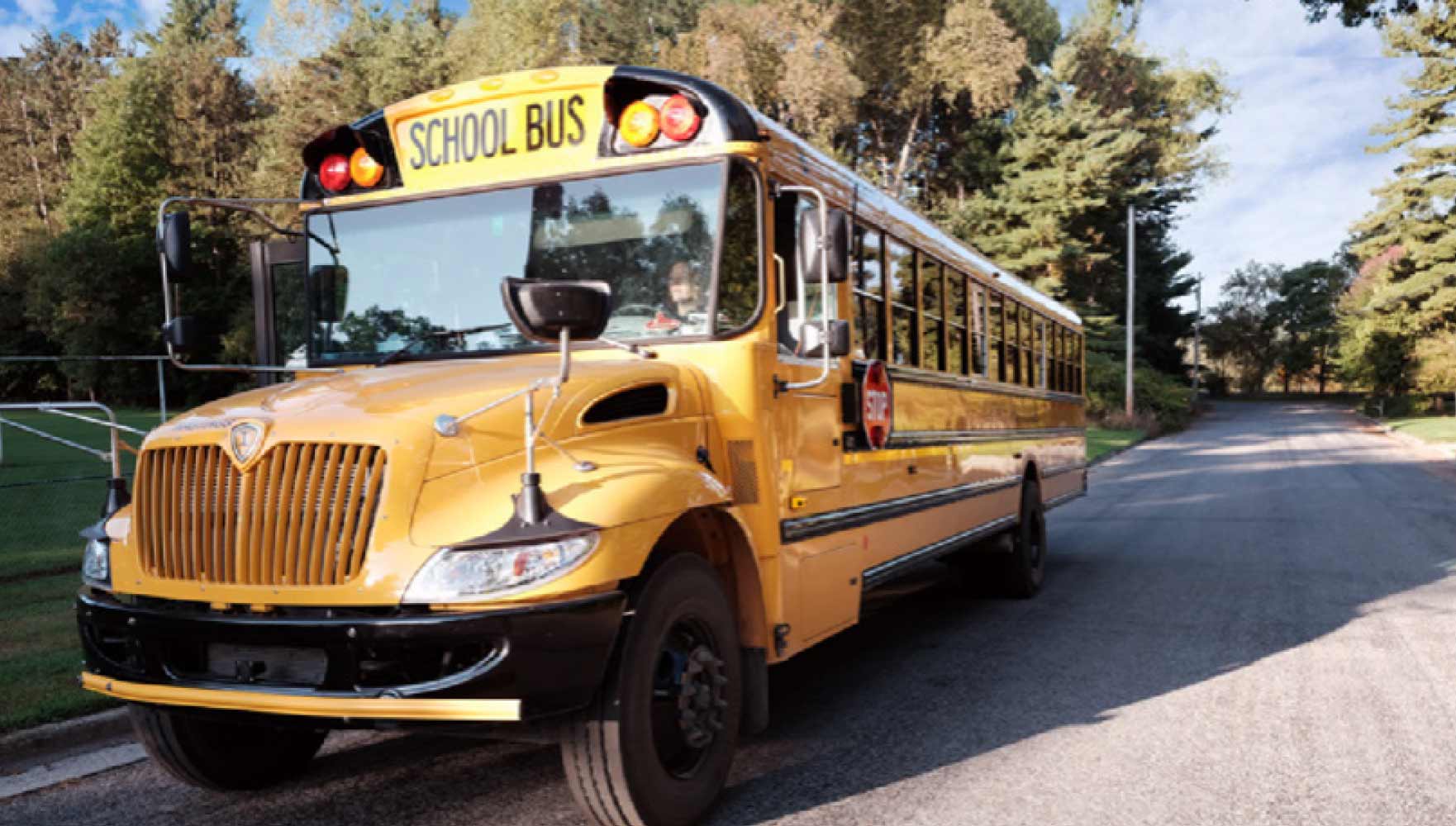 School bus stopped in road
